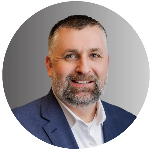 Headshot of Sigma Technologies COO, Adam Ousley